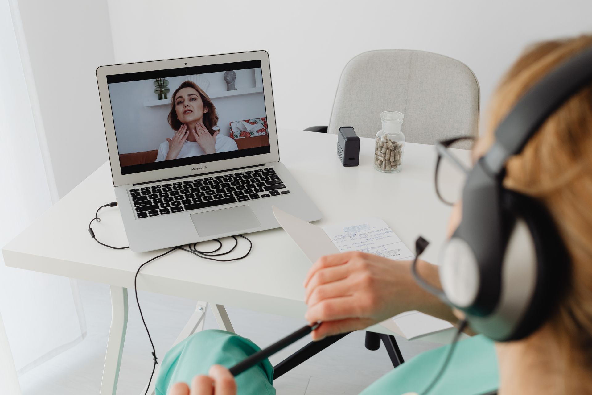 Patient in Rancho Cucamonga conducting a telemedicine video visit with primary care provider Lovella Delos Santos FNP-C